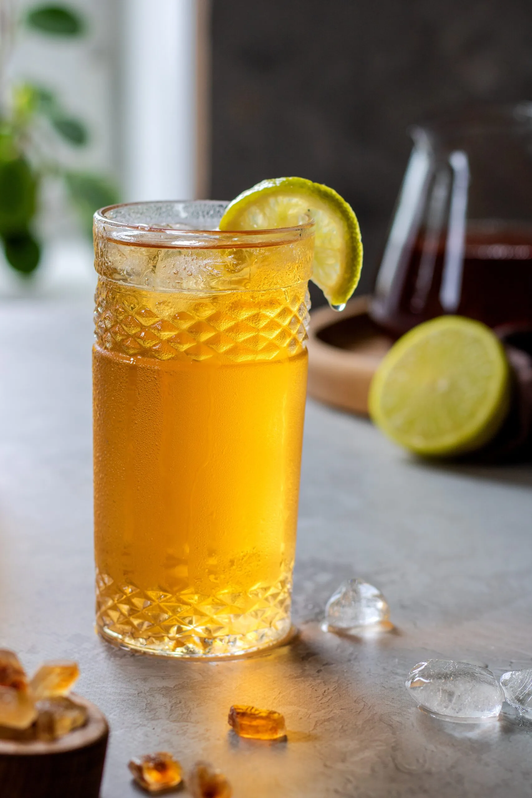 a-glass-of-iced-tea-with-lemon-next-to-pieces-of-2024-09-19-13-29-10-utc