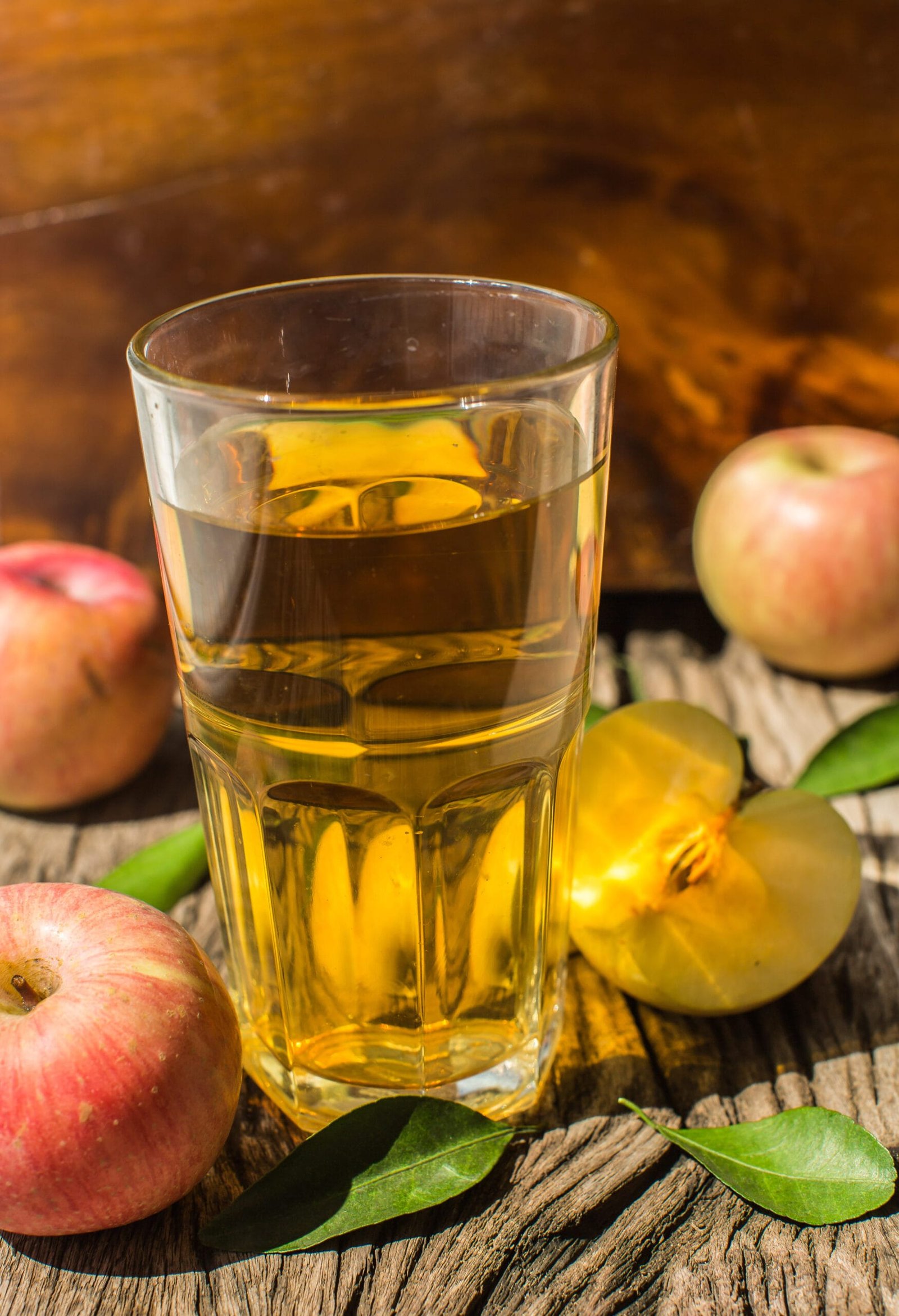 Apple juice on a wooden board
