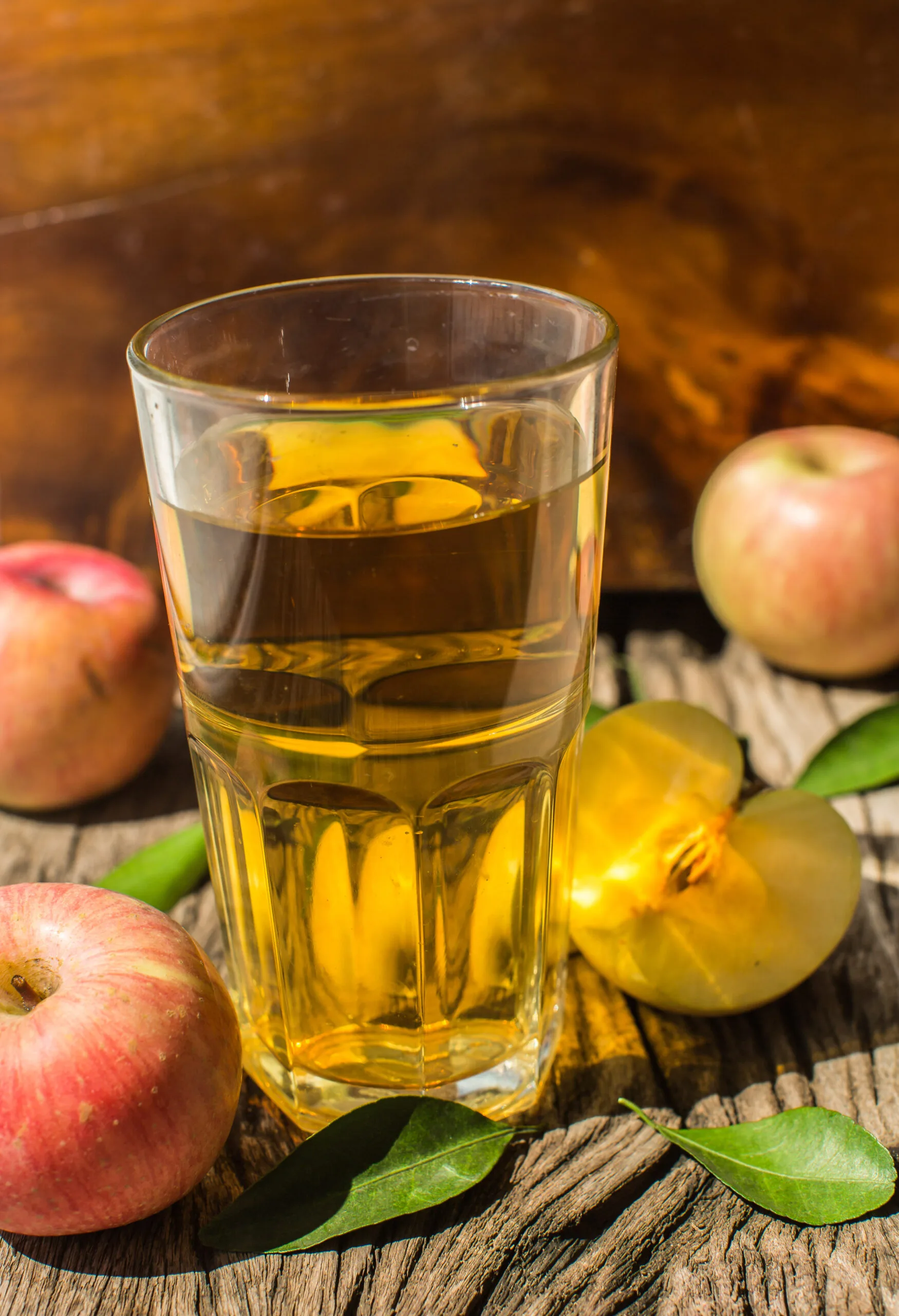 Apple juice on a wooden board