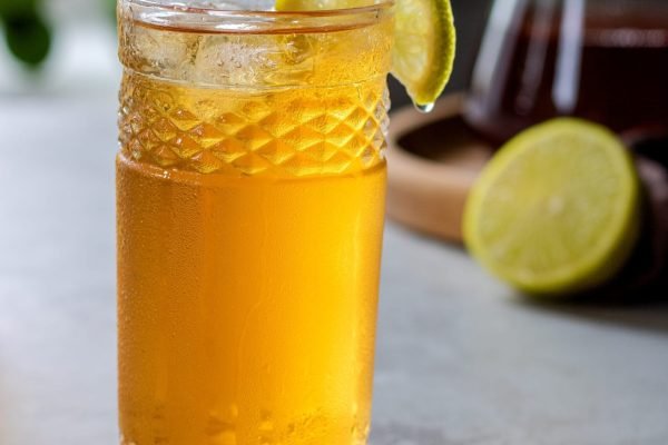 a-glass-of-iced-tea-with-lemon-next-to-pieces-of-2024-09-19-13-29-10-utc