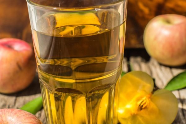 Apple juice on a wooden board